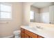 Clean bathroom, featuring a vanity with white countertop and a shower at 558 Olympic Way, Acworth, GA 30102