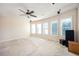Large bedroom with ceiling fan and window at 558 Olympic Way, Acworth, GA 30102
