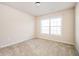 Bright bedroom with neutral walls and carpet at 558 Olympic Way, Acworth, GA 30102