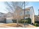 Two-story house with stone accents and a large front yard at 558 Olympic Way, Acworth, GA 30102