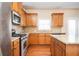 Kitchen with granite countertops and stainless steel appliances at 558 Olympic Way, Acworth, GA 30102