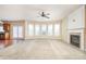 Living room with fireplace and ample natural light at 558 Olympic Way, Acworth, GA 30102