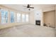 Spacious living room with fireplace and carpet flooring at 558 Olympic Way, Acworth, GA 30102
