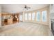 Bright living room featuring a fireplace and hardwood floors at 558 Olympic Way, Acworth, GA 30102