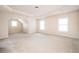 Spacious main bedroom with neutral decor and carpet at 558 Olympic Way, Acworth, GA 30102