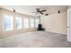 Spacious media room with carpeted floors and multiple windows at 558 Olympic Way, Acworth, GA 30102