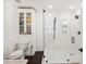 Modern bathroom featuring white subway tile and a frameless glass shower at 2277 Peachtree Ne Rd # 405, Atlanta, GA 30309