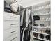 Walk-in closet with custom shelving and ample storage at 2277 Peachtree Ne Rd # 405, Atlanta, GA 30309