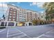 Attractive apartment building exterior with multiple levels and balconies, conveniently located on a city street at 2277 Peachtree Ne Rd # 405, Atlanta, GA 30309
