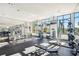 Bright gym featuring state-of-the-art equipment, mirrored walls, and open layout for diverse fitness activities at 2277 Peachtree Ne Rd # 405, Atlanta, GA 30309