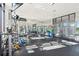 Spacious gym featuring state-of-the-art equipment, mirrored walls, and open layout for diverse fitness activities at 2277 Peachtree Ne Rd # 405, Atlanta, GA 30309