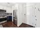 Well lit modern kitchen features stainless steel appliances, updated cabinets and beautiful decorative backsplash at 2277 Peachtree Ne Rd # 405, Atlanta, GA 30309