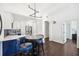 Modern kitchen features white cabinetry, stainless steel appliances, and a stylish breakfast bar at 2277 Peachtree Ne Rd # 405, Atlanta, GA 30309