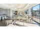 Bright lounge area featuring modern lighting, comfortable seating, and expansive windows with outdoor views at 2277 Peachtree Ne Rd # 405, Atlanta, GA 30309