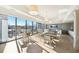 Bright lounge area featuring modern lighting, comfortable seating, and expansive windows with outdoor views at 2277 Peachtree Ne Rd # 405, Atlanta, GA 30309