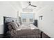 Spacious main bedroom features tray ceilings, hardwood floors, ceiling fan and plantation shutters at 2277 Peachtree Ne Rd # 405, Atlanta, GA 30309