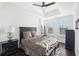 Spacious main bedroom features tray ceilings, hardwood floors, ceiling fan and plantation shutters at 2277 Peachtree Ne Rd # 405, Atlanta, GA 30309