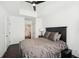 Spacious main bedroom features tray ceilings, hardwood floors, ceiling fan and plantation shutters at 2277 Peachtree Ne Rd # 405, Atlanta, GA 30309