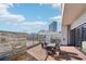 Outdoor patio with barbecue, seating, and building views, perfect for outdoor entertaining and relaxation at 2277 Peachtree Ne Rd # 405, Atlanta, GA 30309