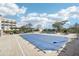 Outdoor pool and lounge area, perfect for recreation, with a pergola, lounge chairs, and manicured greenery at 2277 Peachtree Ne Rd # 405, Atlanta, GA 30309