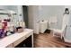 Bathroom featuring a vanity, mirror, shower, and white wooden chair at 2710 Factor Walk Blvd, Suwanee, GA 30024