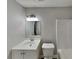 Updated bathroom with white vanity, modern fixtures, and a bathtub at 368 Sumer Ln, Douglasville, GA 30134