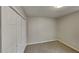 Bright bedroom featuring neutral walls and double closets at 368 Sumer Ln, Douglasville, GA 30134