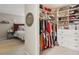 Large walk-in closet with ample shelving and hanging space at 17 Ivy Gates Ne, Atlanta, GA 30342