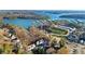 Gorgeous aerial view of residences near beautiful lake with boat docks at 1709 Bald Ridge Marina Rd # 4, Cumming, GA 30041