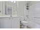 Bathroom with white vanity, toilet and bathtub at 1761 Stanwood Nw Dr, Kennesaw, GA 30152