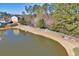 Aerial view of a community pond with benches and walking paths at 1761 Stanwood Nw Dr, Kennesaw, GA 30152