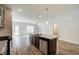 Spacious kitchen island with granite countertop and stainless steel dishwasher at 4331 Portsbrook Ave, Snellville, GA 30039