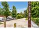 An exterior shot of the Atlanta BeltLine featuring sidewalks, trees, and parking at 1390 Stirling Nw Cir, Atlanta, GA 30318