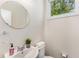 Small bathroom with white sink, toilet and vanity at 1390 Stirling Nw Cir, Atlanta, GA 30318