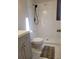 Clean bathroom with gray vanity, white tile, and a shower at 3123 Oak Dr, Marietta, GA 30066