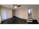 Spacious bedroom with dark hardwood floors, ceiling fan, and double door closet at 3123 Oak Dr, Marietta, GA 30066