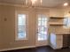 Bright dining area with French doors leading to the deck at 3123 Oak Dr, Marietta, GA 30066