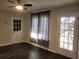 Living room with dark hardwood floors, neutral walls, and French doors leading outside at 3123 Oak Dr, Marietta, GA 30066