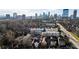 Aerial view of townhomes near the city skyline at 3674 Kingsboro Ne Rd, Atlanta, GA 30319