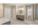 Elegant bathroom with marble vanity, tiled floors, and a large shower at 3674 Kingsboro Ne Rd, Atlanta, GA 30319