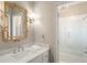 Clean bathroom with a quartz countertop and a shower at 3674 Kingsboro Ne Rd, Atlanta, GA 30319