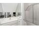 Small bathroom with white vanity and shower/tub combo at 3674 Kingsboro Ne Rd, Atlanta, GA 30319