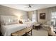 Spacious bedroom with two queen beds, neutral decor, and ample natural light at 3674 Kingsboro Ne Rd, Atlanta, GA 30319