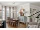 Bright dining area with french doors and hardwood floors at 3674 Kingsboro Ne Rd, Atlanta, GA 30319