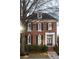 Front view of brick home with black shutters at 3674 Kingsboro Ne Rd, Atlanta, GA 30319