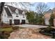 Two-car garage with a charming design and a spacious driveway at 3674 Kingsboro Ne Rd, Atlanta, GA 30319