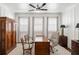 Bright home office with built-in bookcases and hardwood floors at 3674 Kingsboro Ne Rd, Atlanta, GA 30319