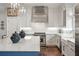 Bright kitchen featuring white cabinets and marble countertops at 3674 Kingsboro Ne Rd, Atlanta, GA 30319