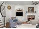 Living room with a fireplace, built-in shelving and a comfortable sectional sofa at 3674 Kingsboro Ne Rd, Atlanta, GA 30319