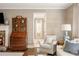 Sitting area off of main bedroom with antique secretary at 3674 Kingsboro Ne Rd, Atlanta, GA 30319